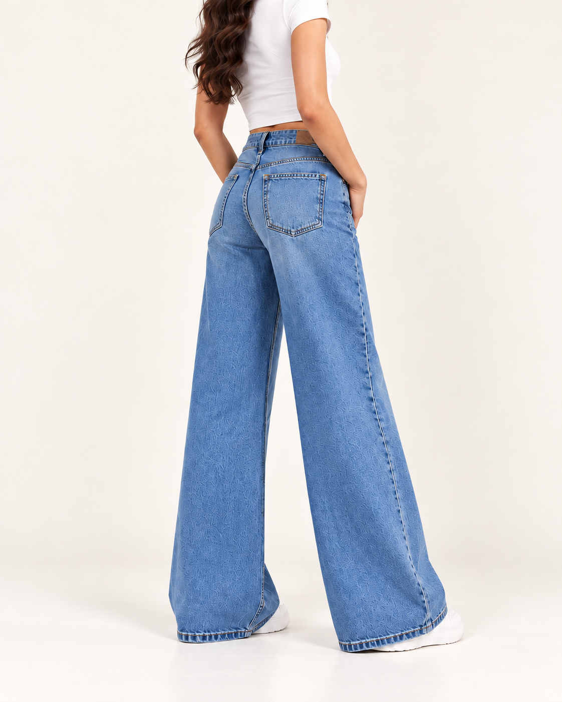 Back view of Aquila faded mid-blue wide-leg jeans