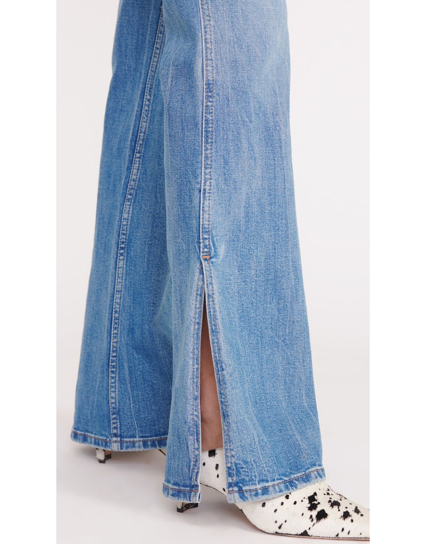 Flared Jeans with Slit Hem in Mid Blue