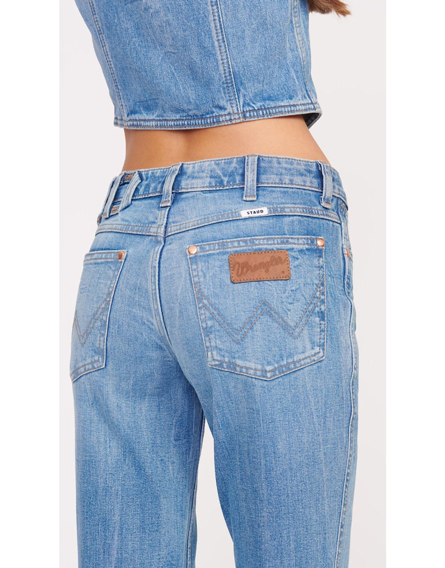 Flared Jeans with Slit Hem in Mid Blue